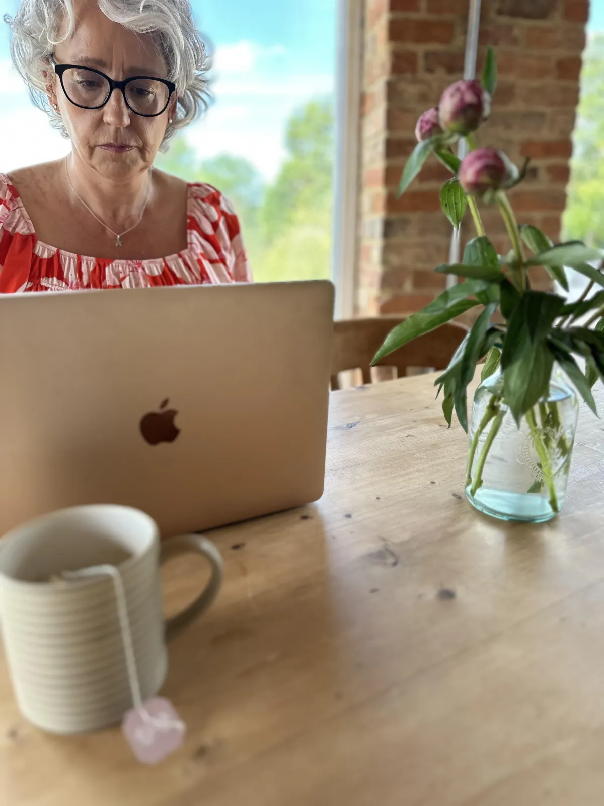 Lisa working at laptop