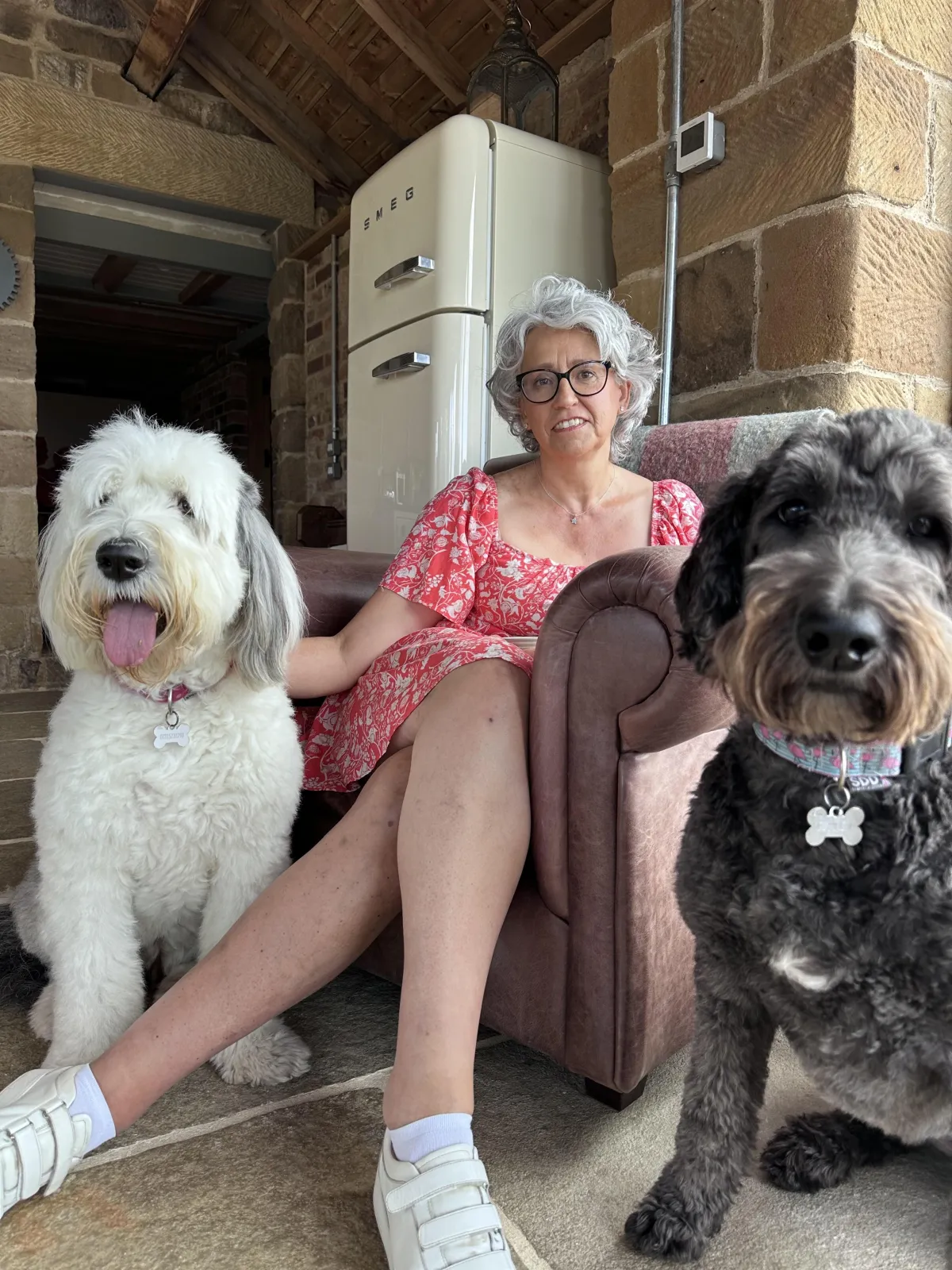 Lisa relaxing with her dogs