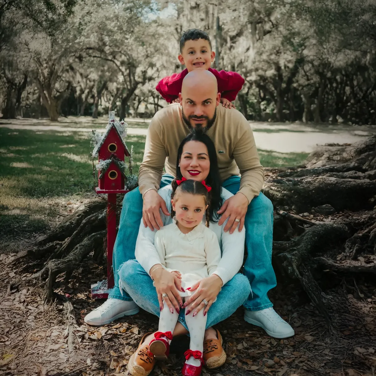Warm photo of an outdoor family session for Christmas on Stuart