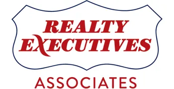The logo features the text "Southern Charm" in a combination of bold and script-style fonts, alongside the words "Dream Homes" in a clean, modern typeface. To the right, there is an illustration of two minimalist house outlines, with a light blue square background. The design conveys elegance and professionalism, ideal for a real estate brand focused on stylish and inviting homes.