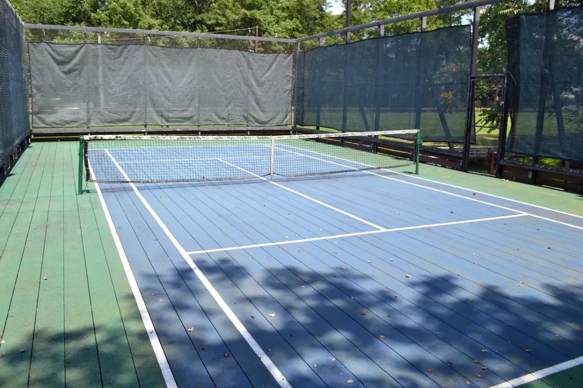 Custom tennis court construction with clean finished surface