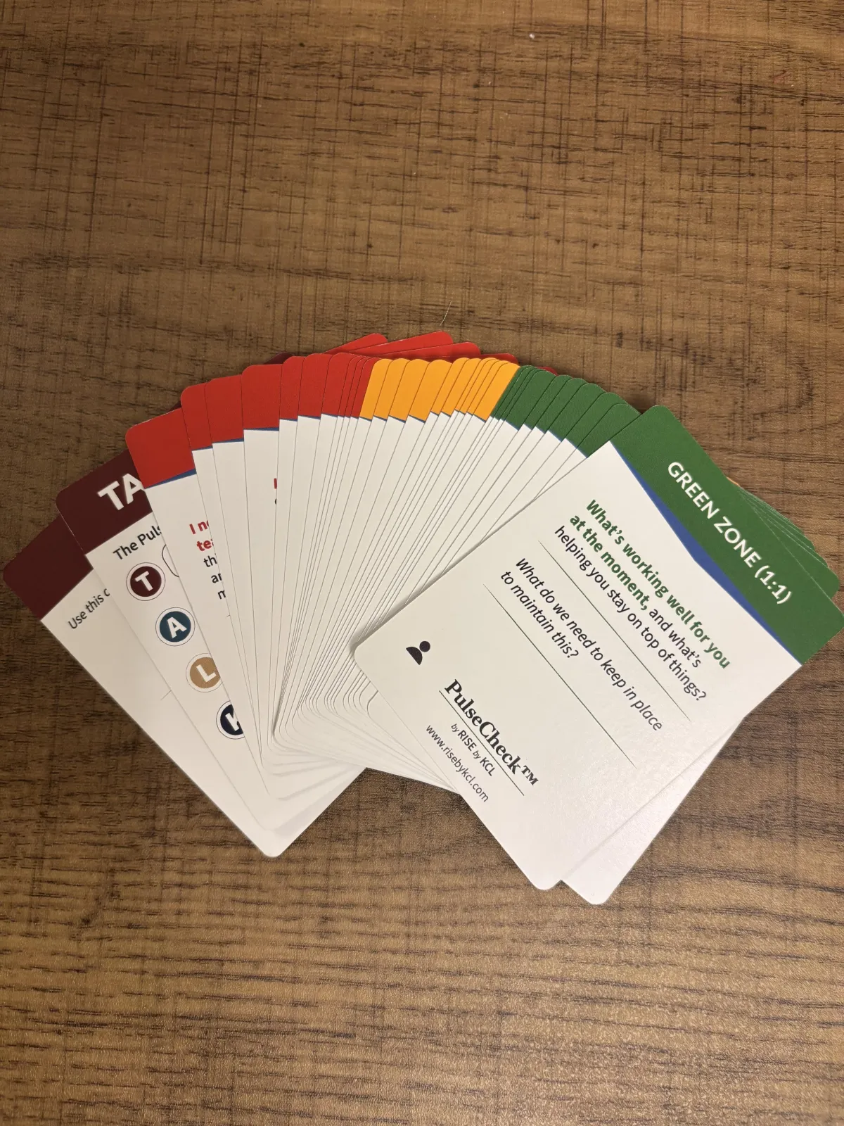 PulseCheck cards fanned out showing different zones and prompt details