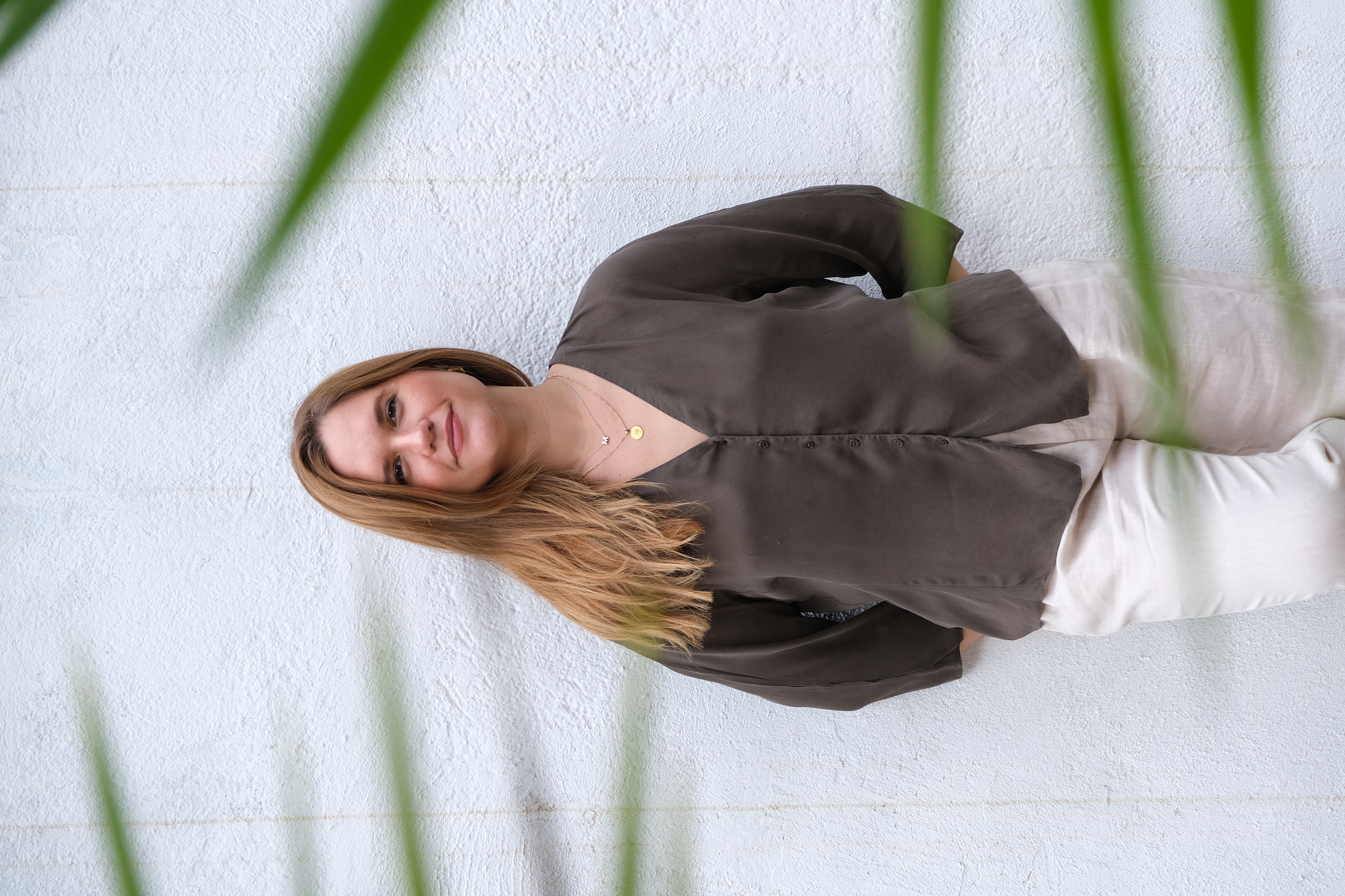 Portrait of coach Merce Maresma smiling softly.