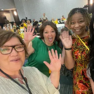 Three women taking selfie at EQUIP real estate conference