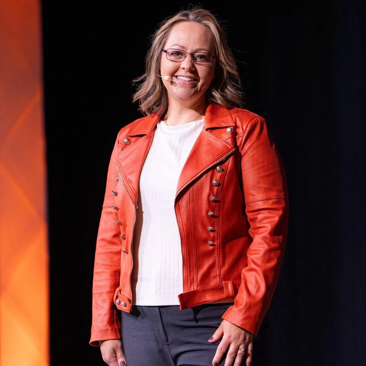 Headshot of Lisa Binggeli, who inspires real estate success through financial freedom, personal branding, and work-life balance.