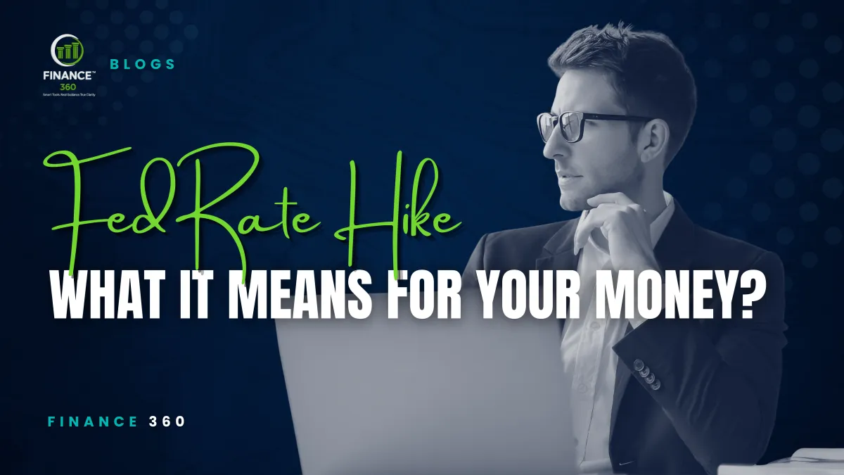 Finance 360 blog cover about the Fed rate hike, showing a professional reviewing finances on a laptop.