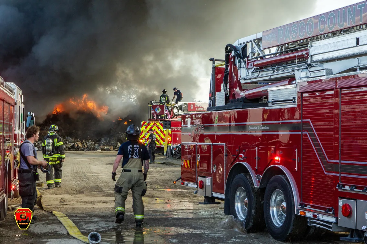 Pasco County Professional Firefighters fighting a junk yard fire