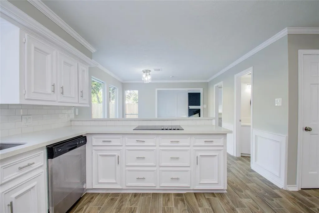 Completed Spring kitchen remodel with wood cabinets