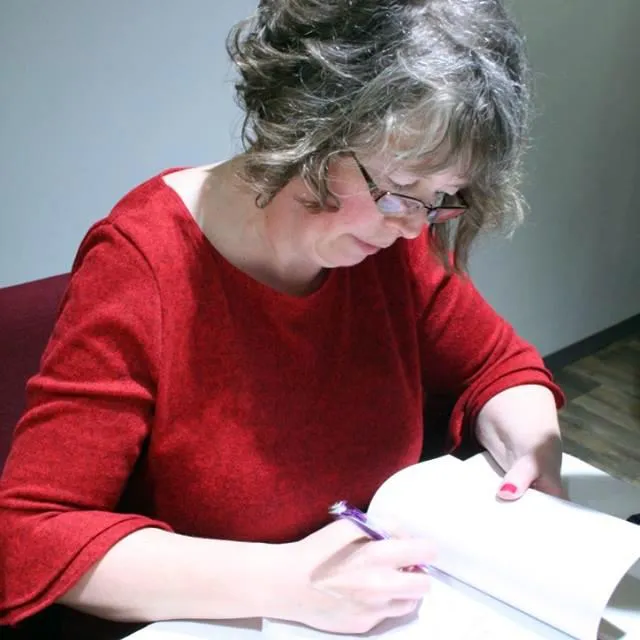 Cheryl Krichbaum signing books