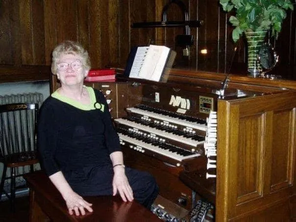 my mom a her preferred pipe organ