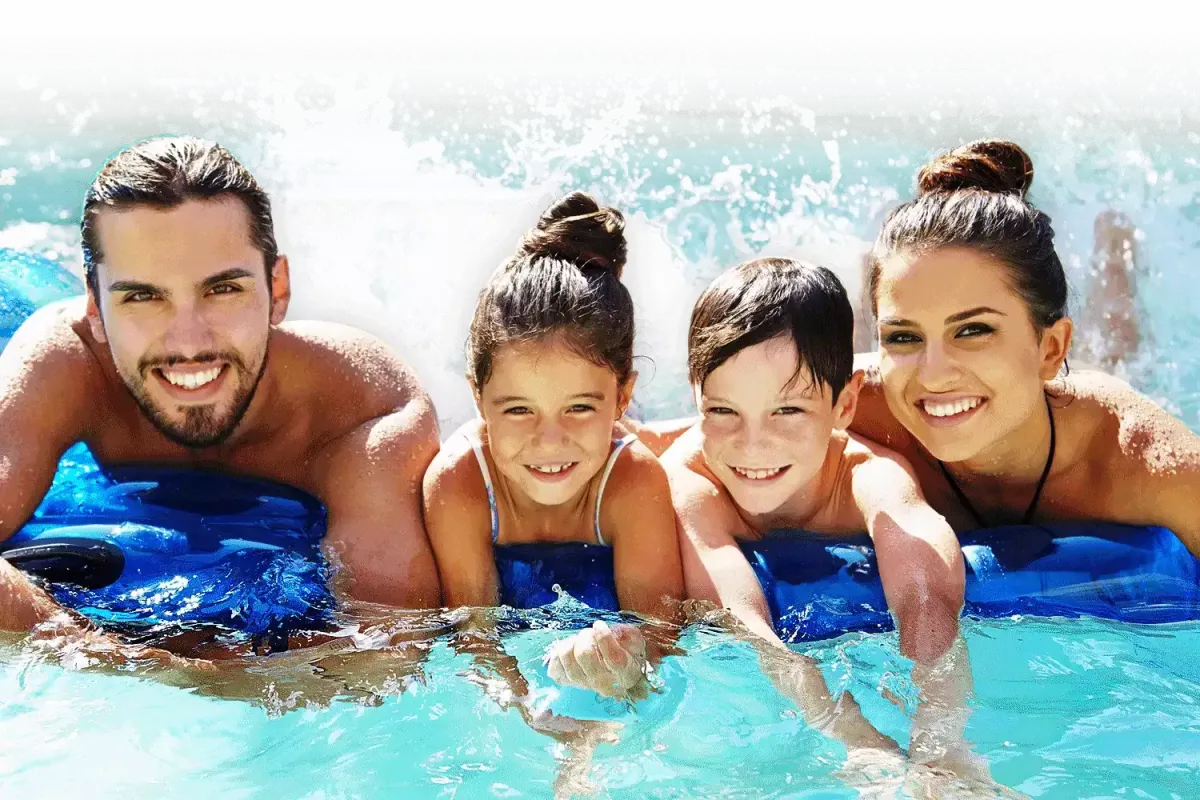 happy family in swim spa