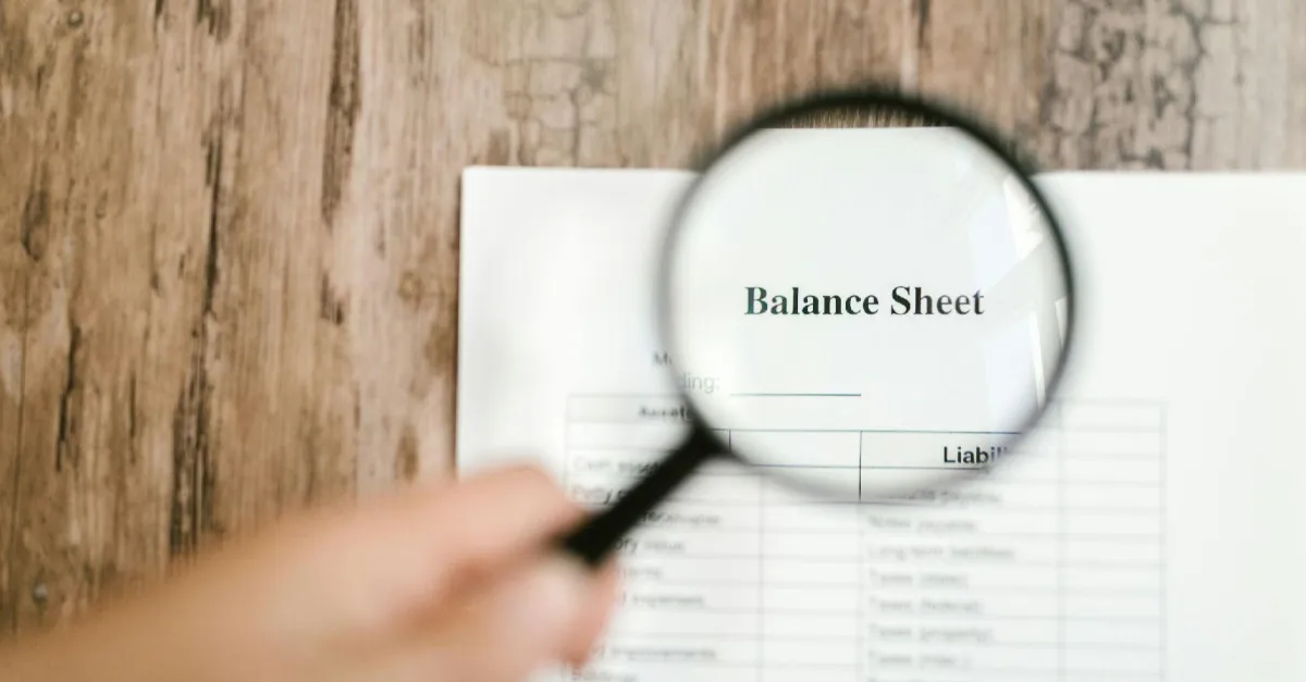 gold and black round analog watch