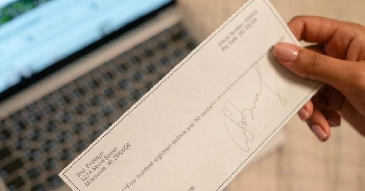 a computer screen with a cloud shaped object on top of it