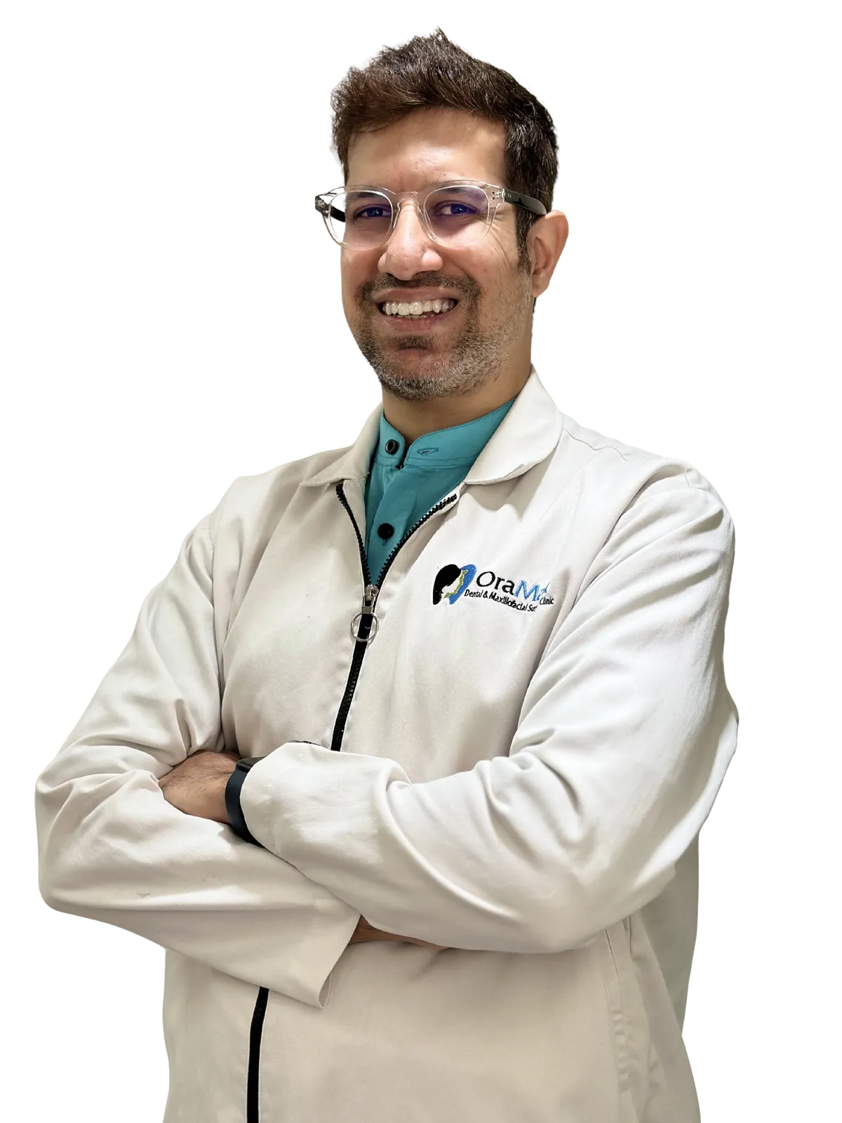 Cutout photo of Dr. Khushal Gangwani standing with arms crossed, smiling, wearing a white coat over a black shirt with the clinic logo.