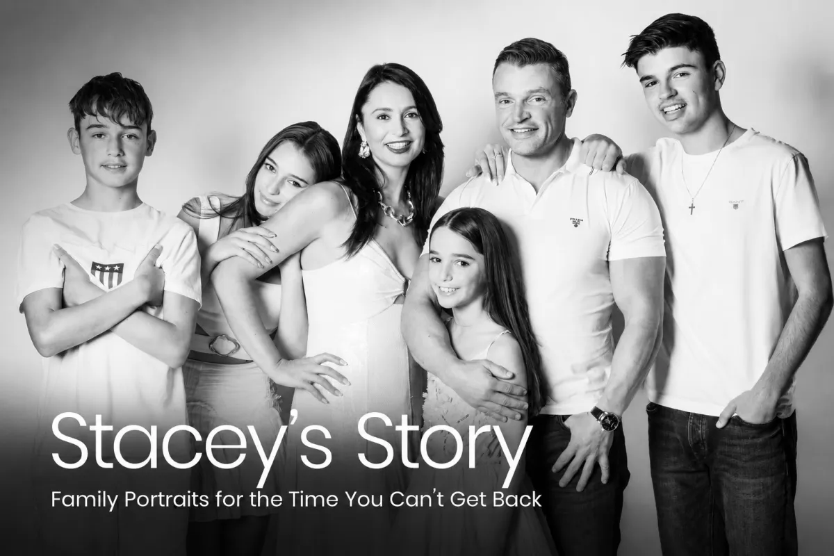 Black and white portrait of a family on a white background