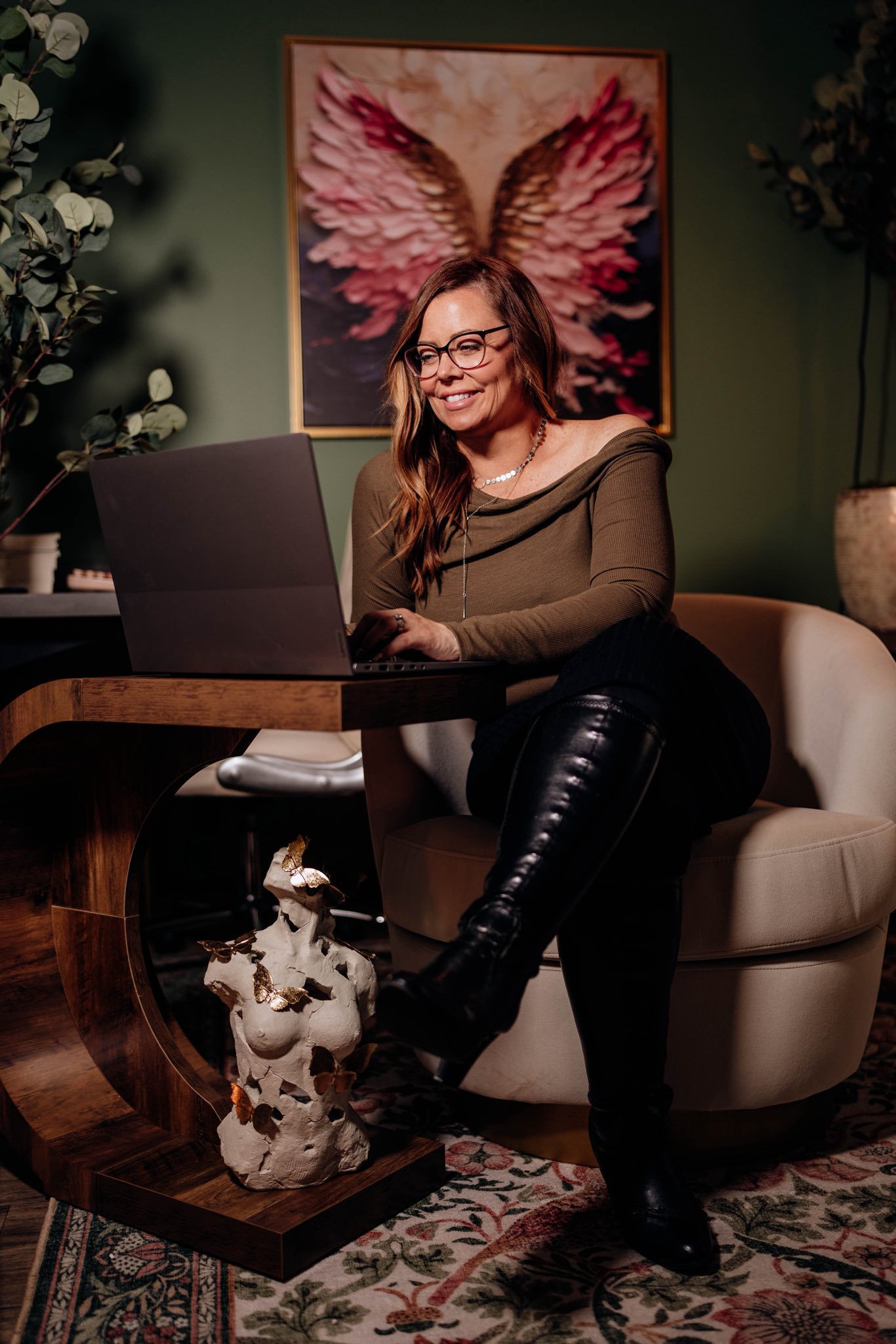 Warm, professional photograph of Cristie in a natural setting