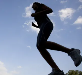 Woman enjoying a smooth outdoor run with improved wellness and mobility, representing the trusted pain relief and holistic care people choose at VitalQi in Cupertino.
