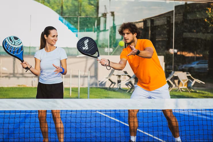 two active people playing padel tennis after pain control treatment at cupertino ca pain control clinic.