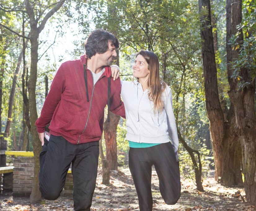 couple enjoying a walk outdoors after using natural remedies for cold & flu from an herbal medicine practitioner in cupertino ca.