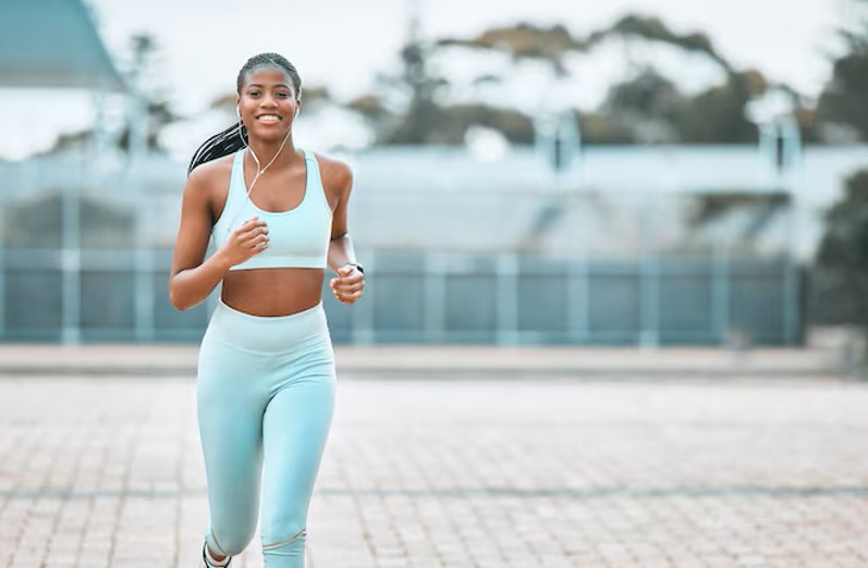 woman running pain-free and feeling strong after visiting acupuncture clinic in cupertino ca for relief.