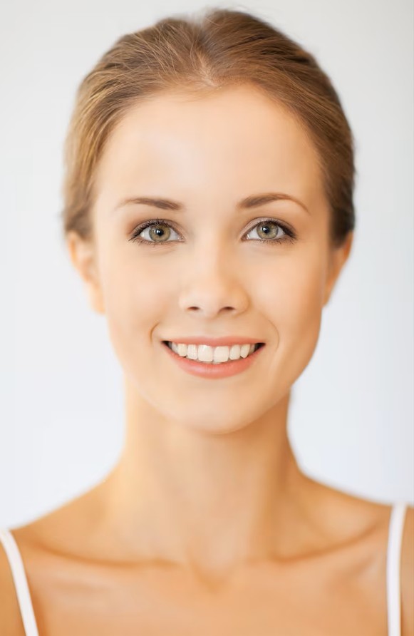 glowing woman smiling after a session at a top acupuncture clinic in cupertino ca.