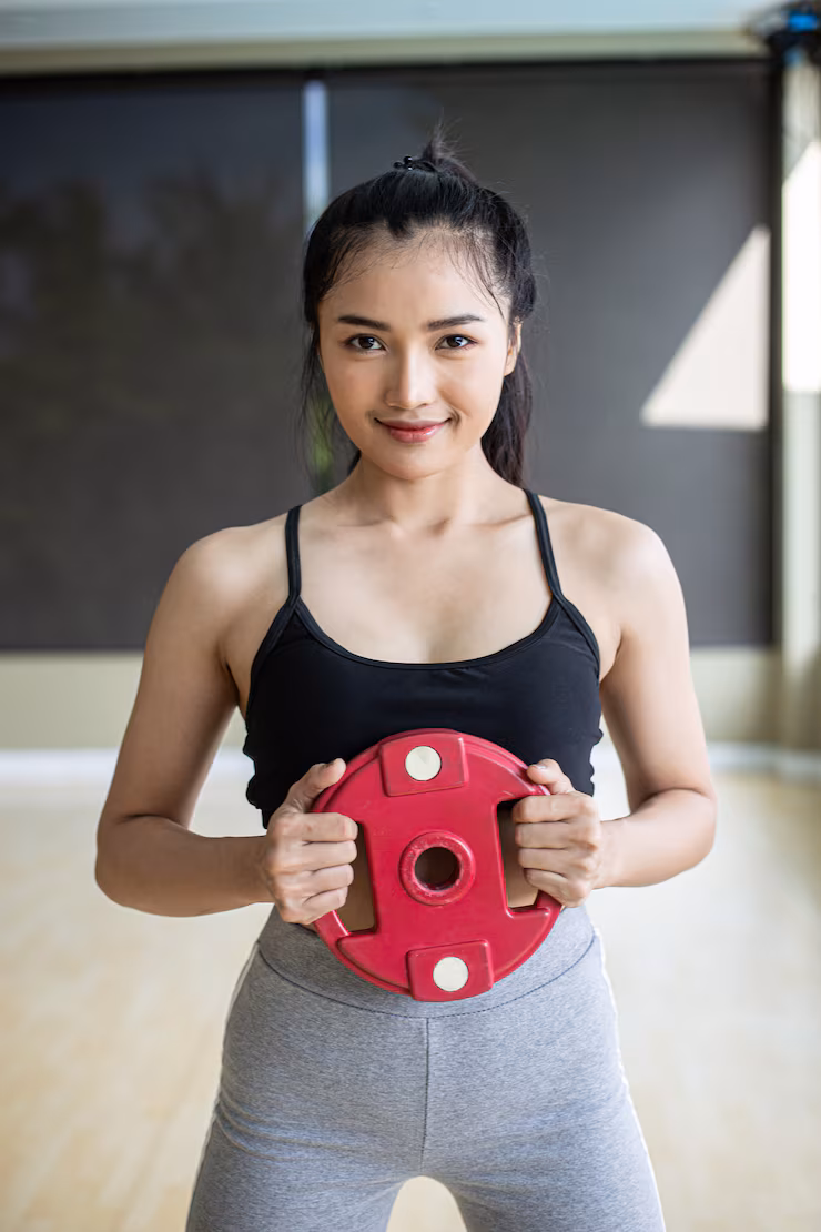 confident woman at the gym feeling great after her session at a cosmetic acupuncture clinic in cupertino ca.