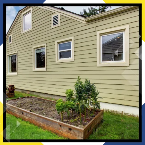 Licensed and insured siding contractors reviewing exterior siding 