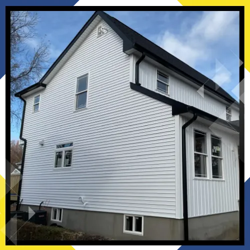 Siding repair team checking a home exterior in West Orange, NJ 