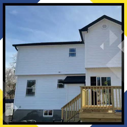 Licensed and insured siding contractors preparing exterior work 