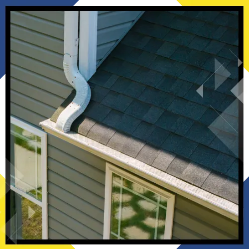 New gutters guiding rainwater away from a property 