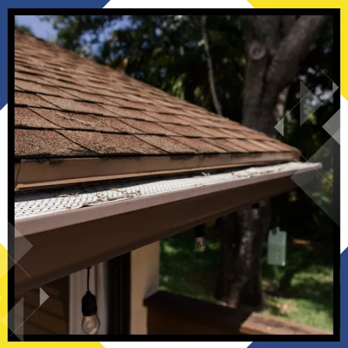 Seamless gutter installation along a clean roofline 