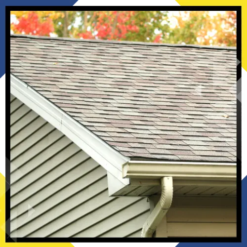 Licensed roofing installers working on a roof in Orange NJ 