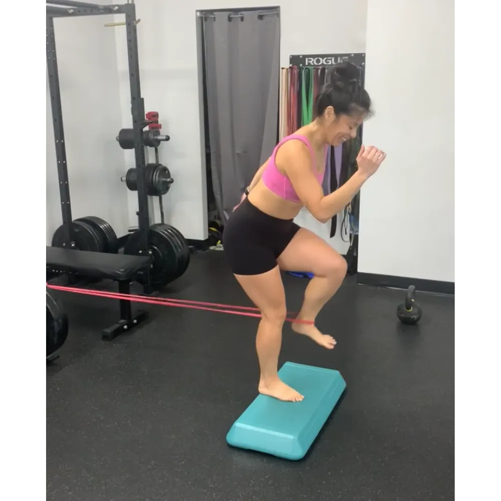 A patient performing rehabilitation exercises for back pain at Kaizo Health