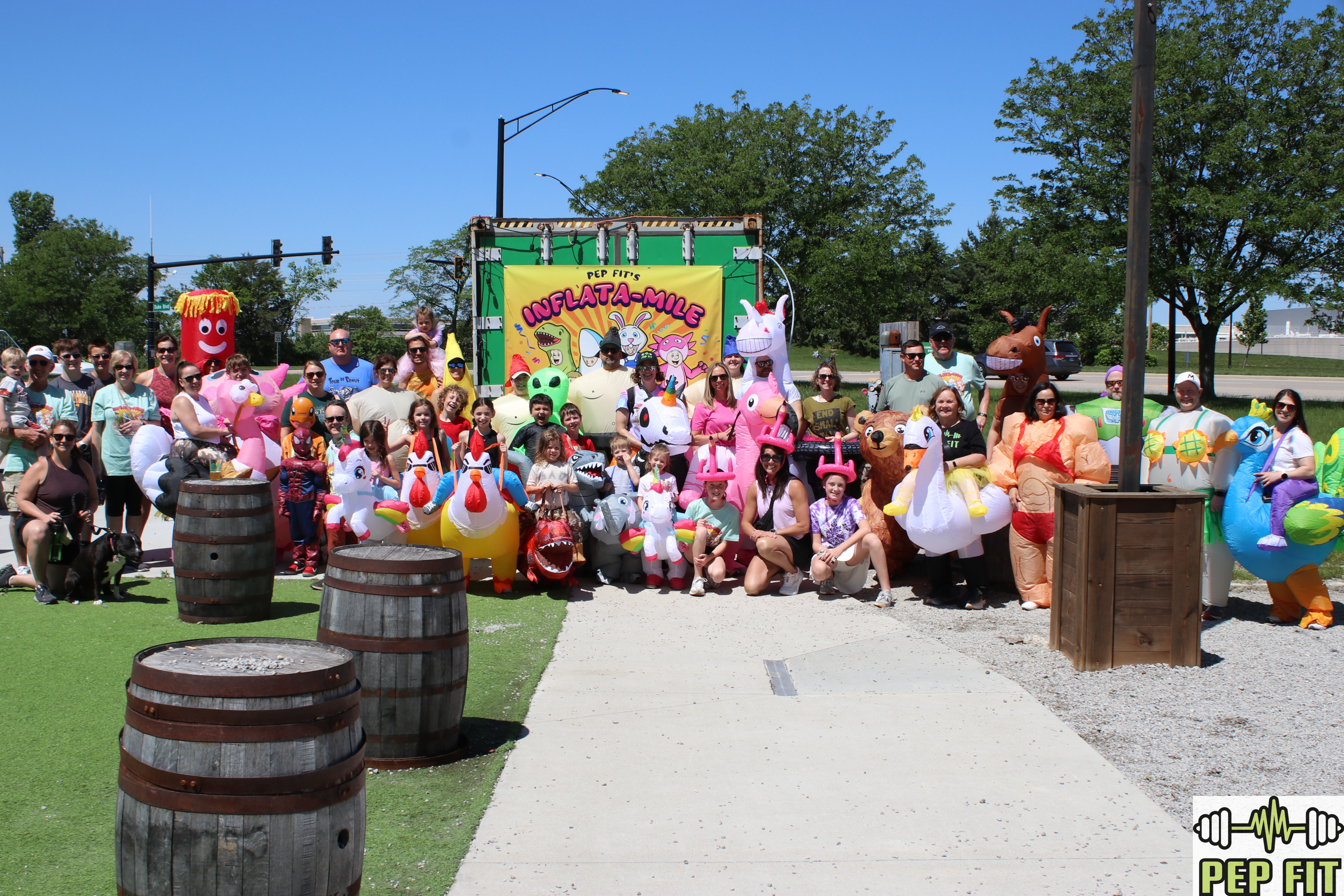 Families and women walking together during the PEP FIT Inflata-Mile community event