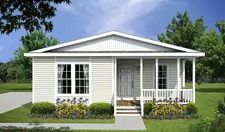 Single-story house with light-colored siding, a front porch with white railings, and steps leading to a gray front door. There are two large front windows and bushes with yellow flowers in the yard. Ideal for those seeking modular homes in North Carolina, this charming residence offers both style and comfort.