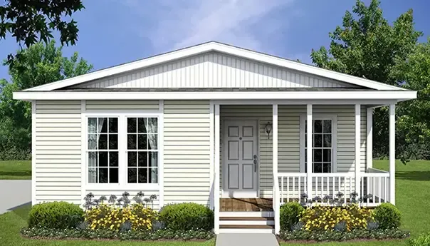 Single-story house with light-colored siding, a front porch with white railings, and steps leading to a gray front door. There are two large front windows and bushes with yellow flowers in the yard. Ideal for those seeking modular homes in North Carolina, this charming residence offers both style and comfort.