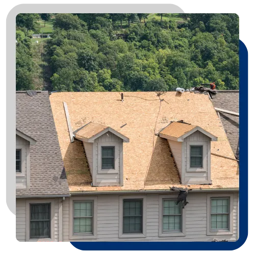 Roofing team inspecting a home roof in Peoria, IL 