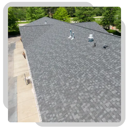 Roof repair work on a damaged home roof in Peoria, IL 