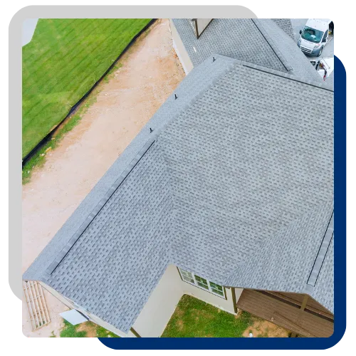 Roofing team repairing a commercial building roof 