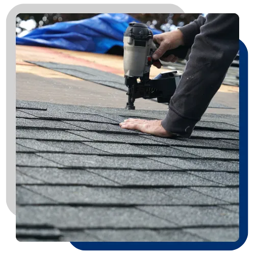 Roof repair team working on a home in Galesburg, IL 