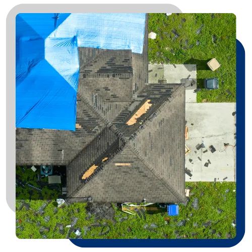 Close view of wind-lifted shingle repair on a residential roof after a strong storm. 