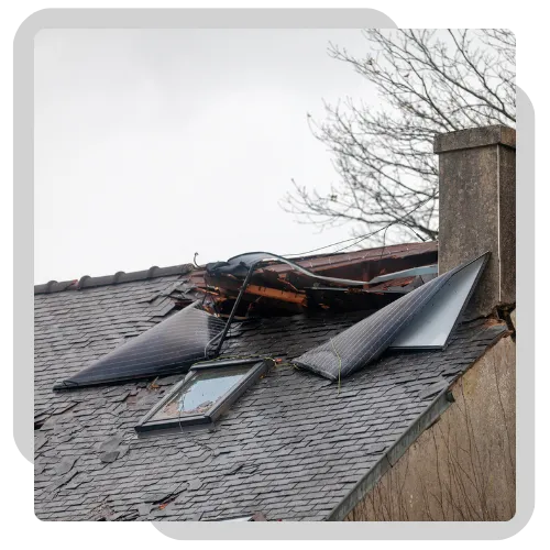Roofing expert checking hail and wind damage on a home roof in Moline, Illinois. 