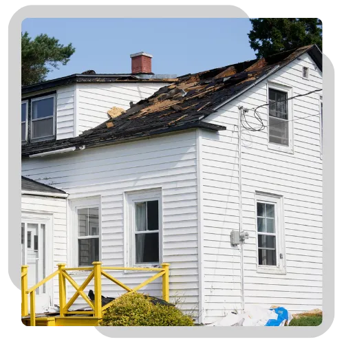 Emergency roof repair crew fixing storm damage on a Peoria home 