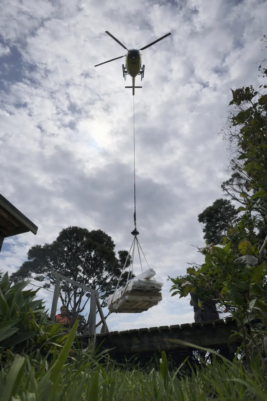 Kawau Island building materials helicopter lift coastal project