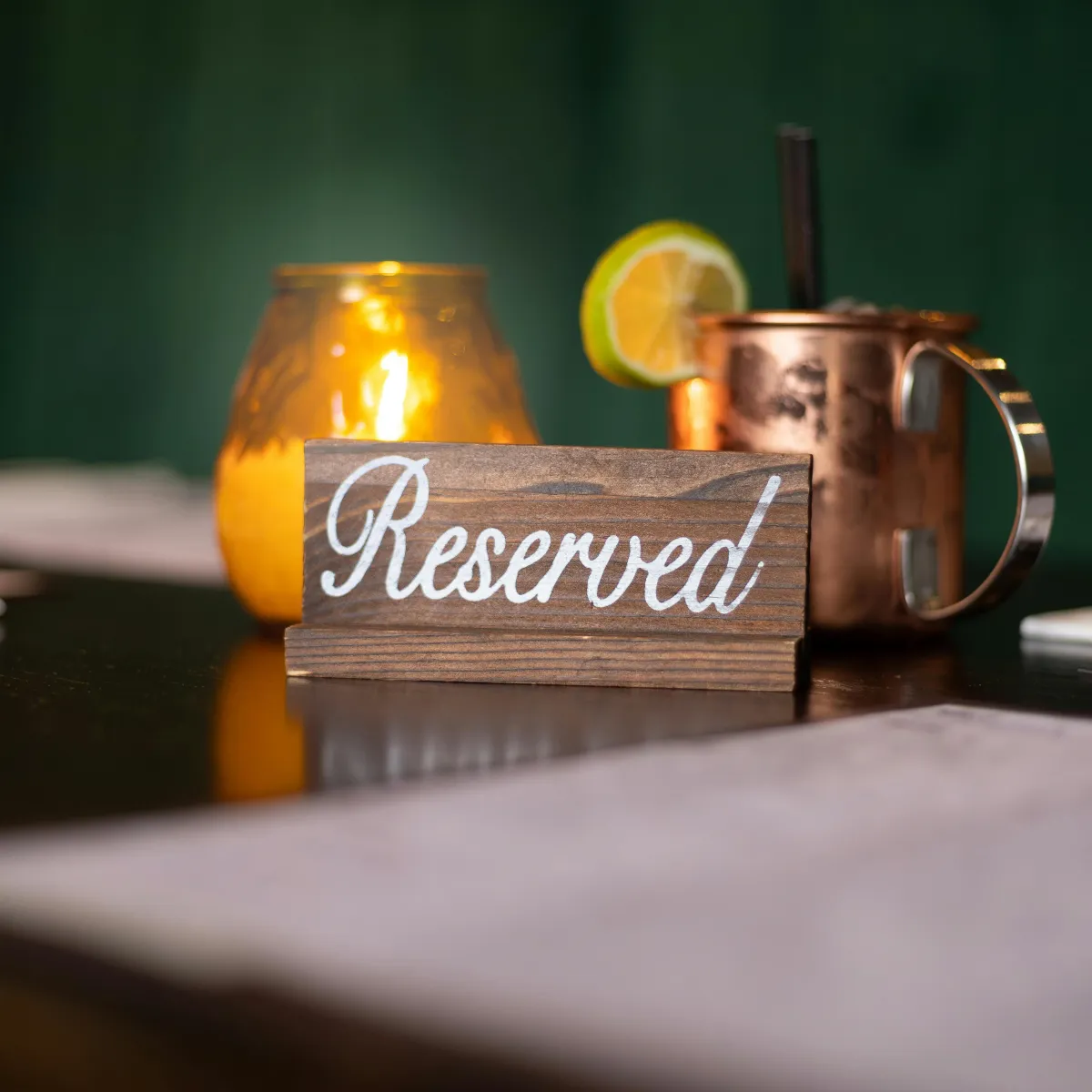 a long table with a bunch of glasses on it