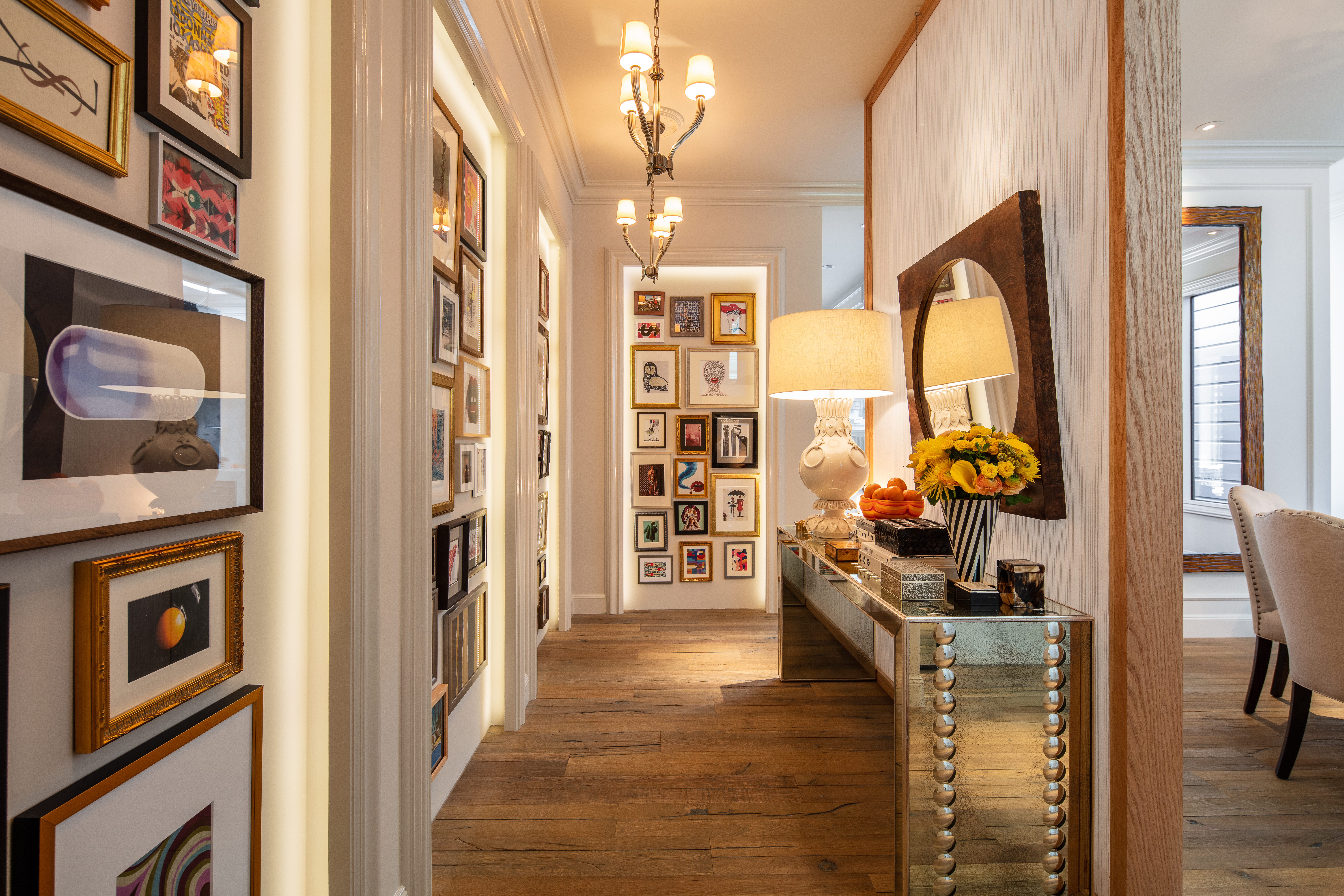 luxury real estate photo of a high-end entry way with gallery wall decor