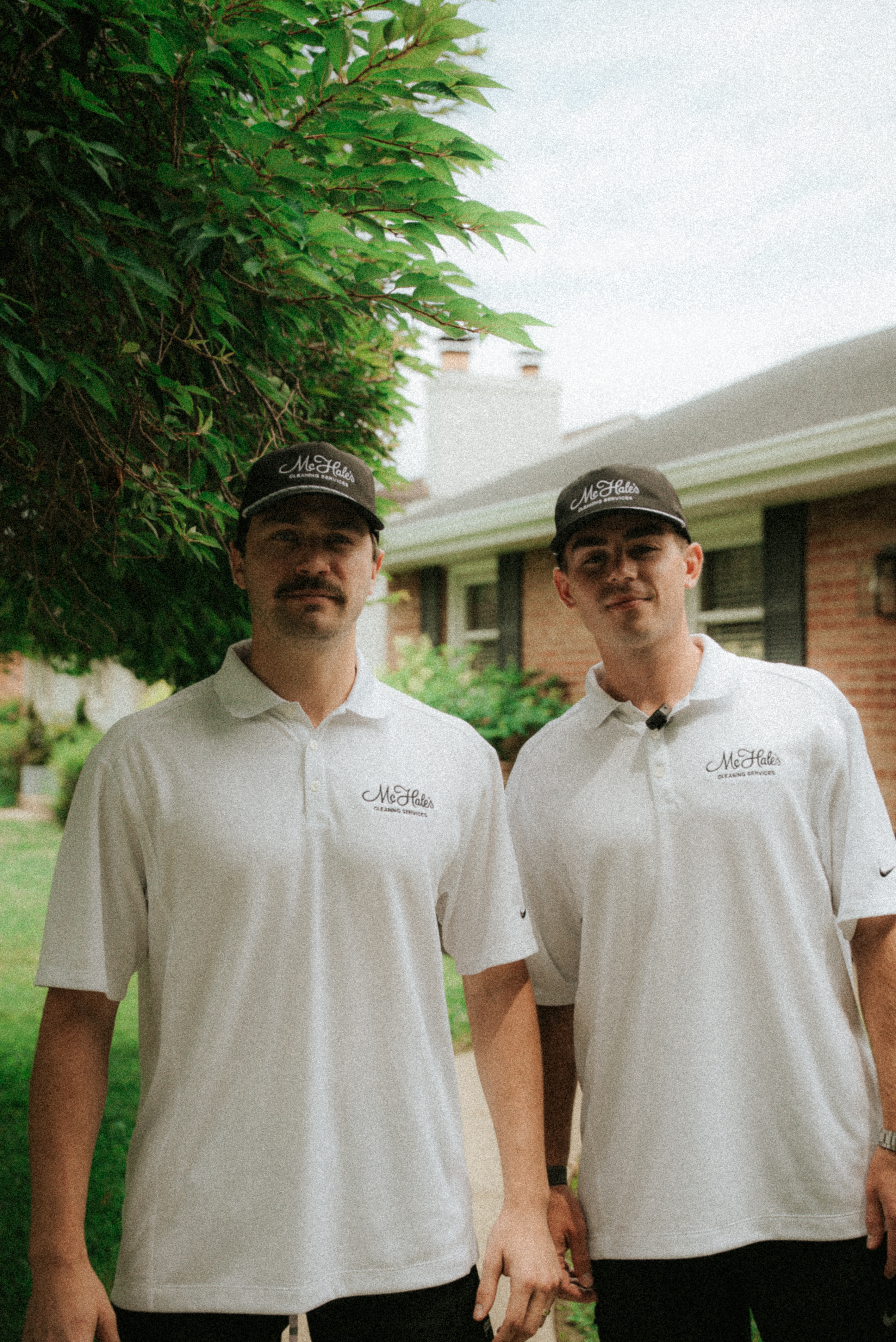 Professional cleaning team in uniform representing 30 years of McHale's heritage