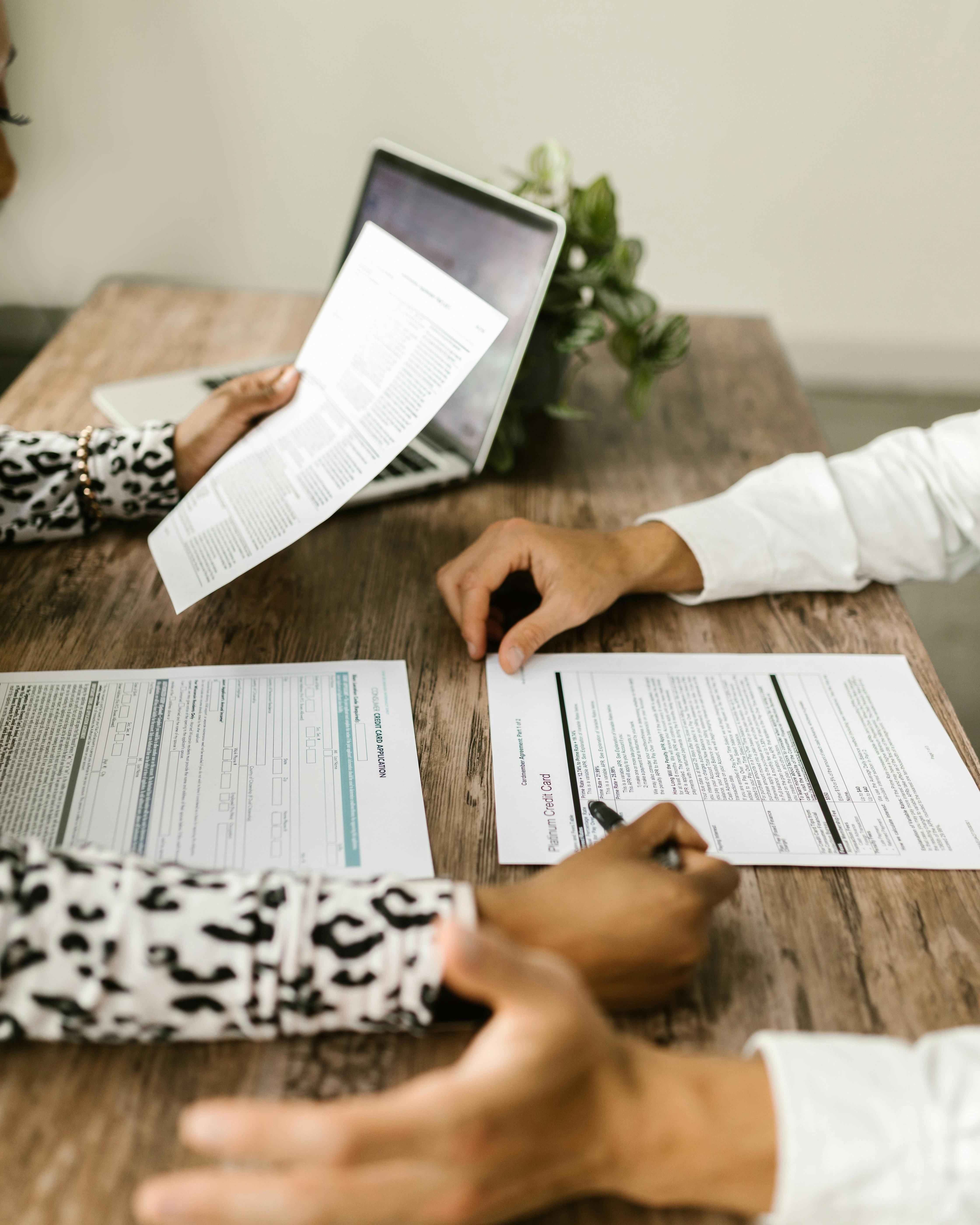 Tax preparation consultation reviewing tax documents with SVEEA Financial