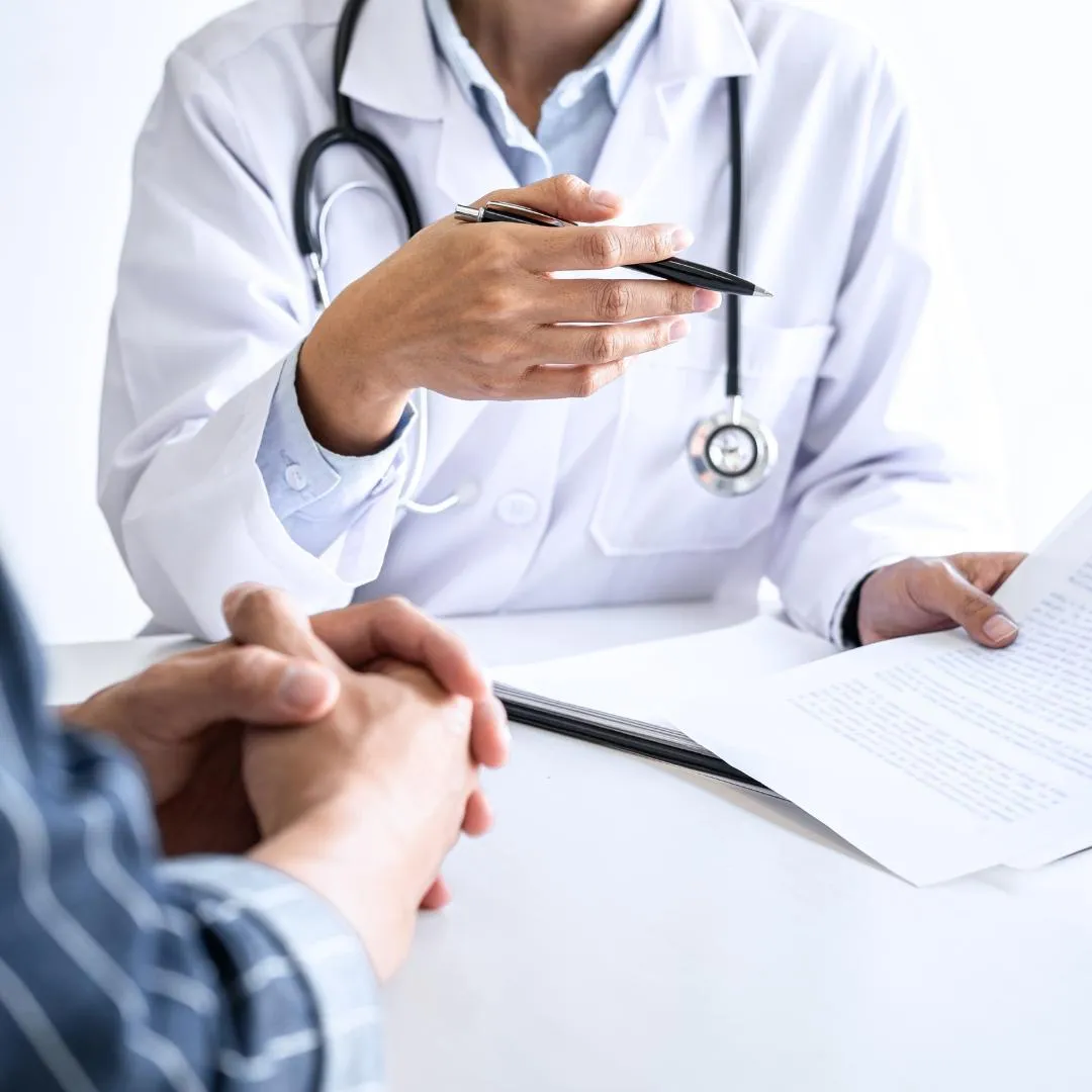 young female patient speaking with her doctor