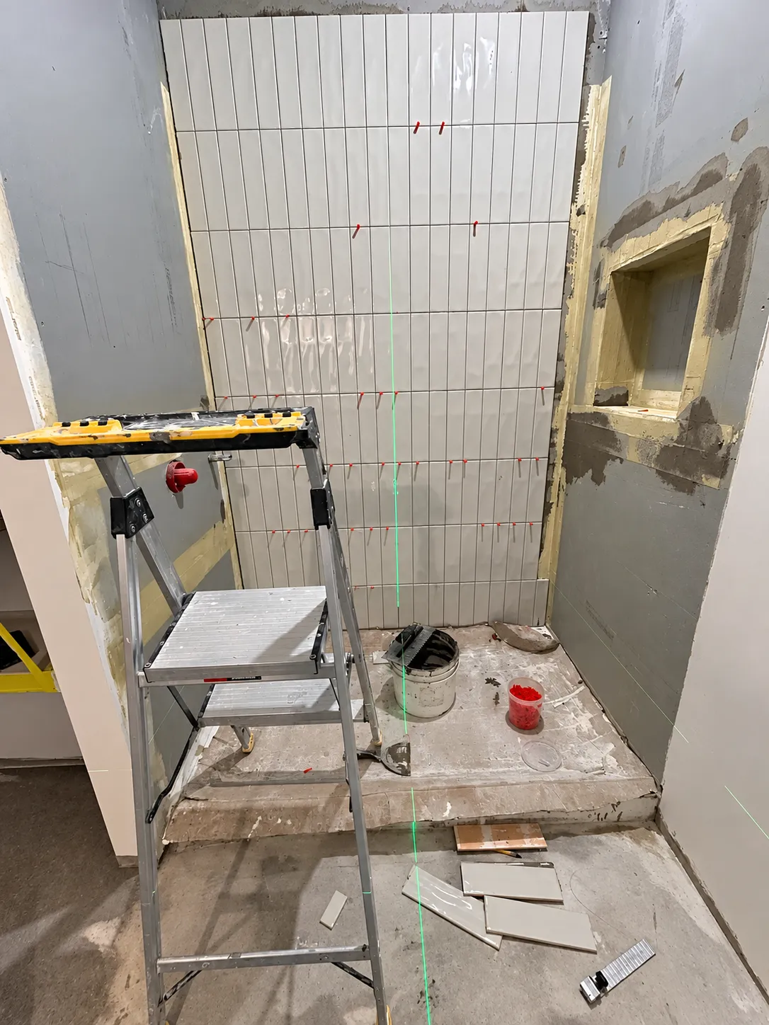 Bathroom shower tile installation in progress in Calgary